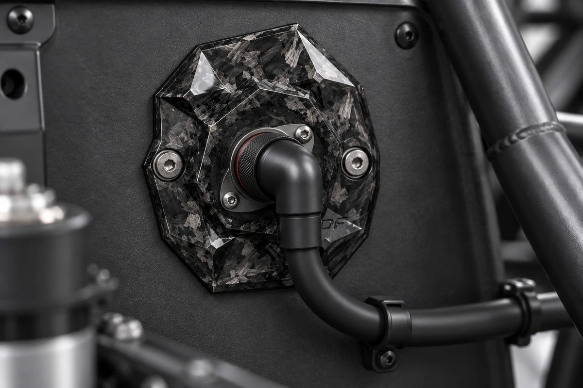 Dorifab compact single left forged carbon bulkhead connector plate, installed view. Illustrative connector installation; connectors not included.