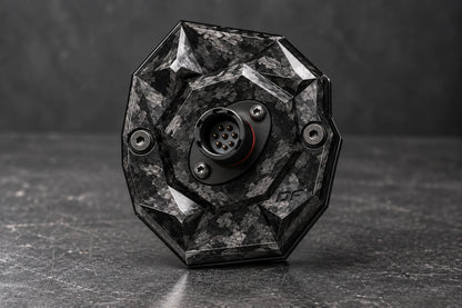Dorifab compact single right forged carbon bulkhead connector plate, hero view. Illustrative connector installation; connectors not included.