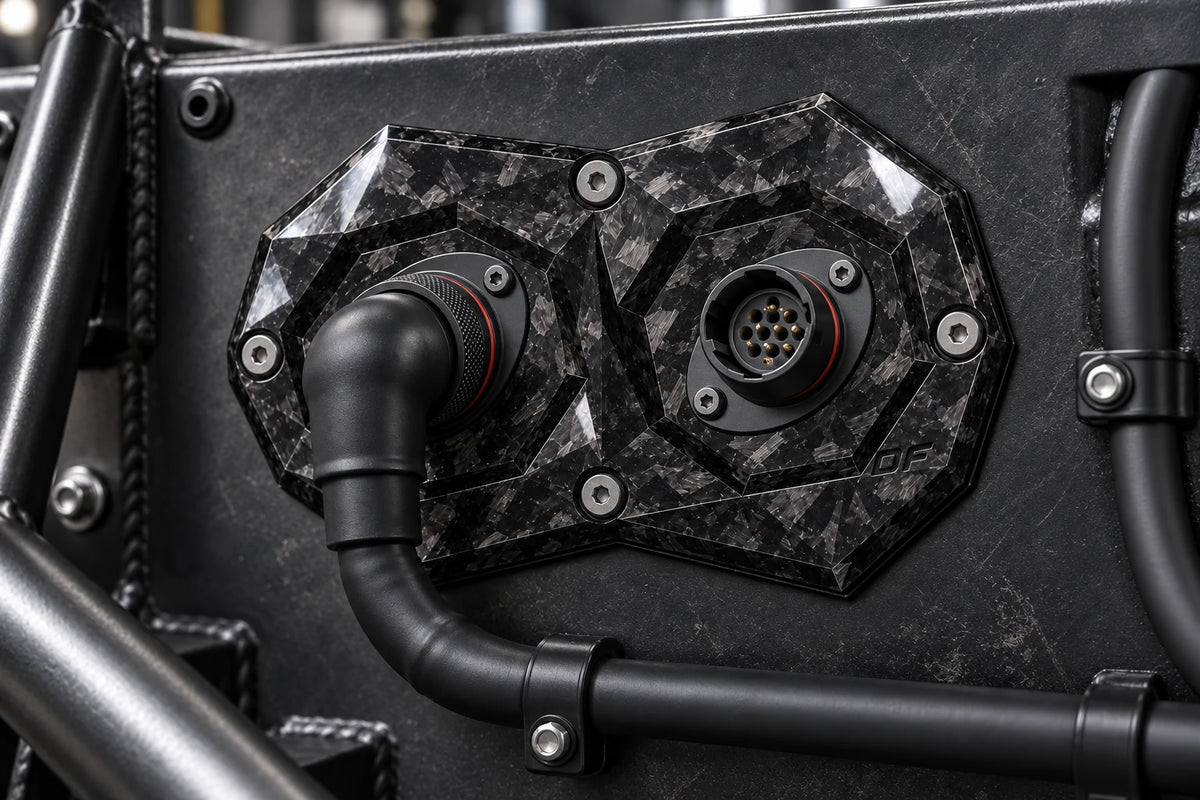 Dorifab compact dual forged carbon bulkhead connector plate, installed view. Illustrative connector installation; connectors not included.