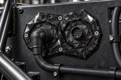 Dorifab compact dual forged carbon bulkhead connector plate, installed view. Illustrative connector installation; connectors not included.