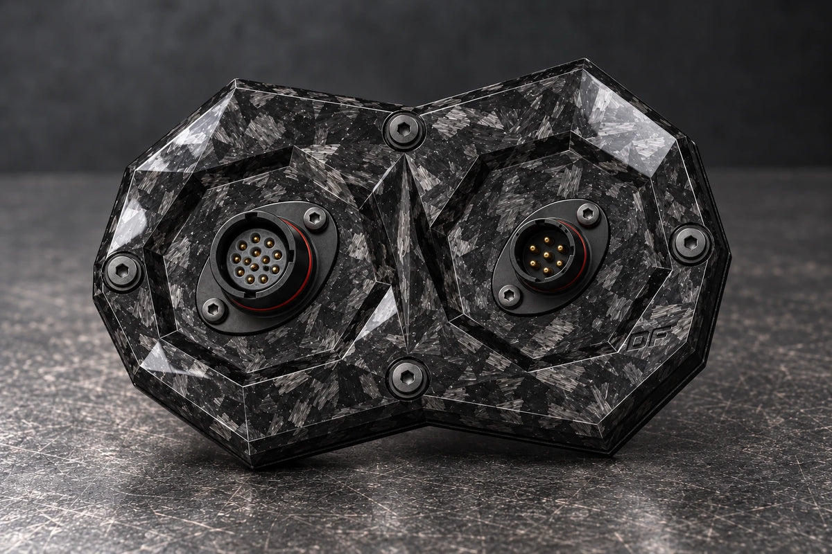 Dorifab compact dual forged carbon bulkhead connector plate, mixed shell sizes view. Illustrative connector installation; connectors not included.