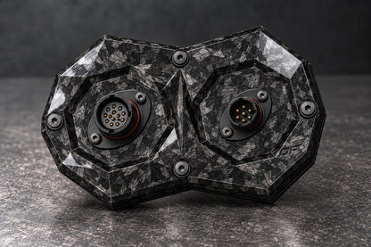 Dorifab compact dual forged carbon bulkhead connector plate, mixed shell sizes view. Illustrative connector installation; connectors not included.