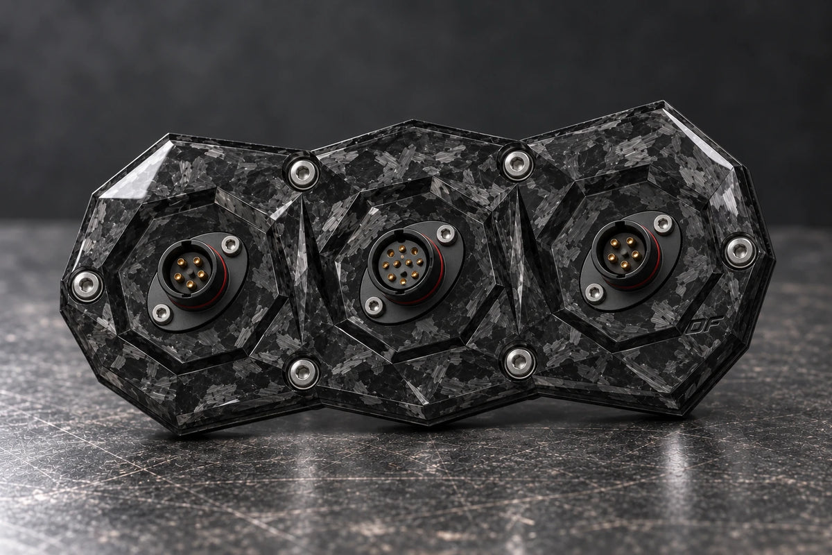 Dorifab compact triple forged carbon bulkhead connector plate, alternating shell sizes view. Illustrative connector installation; connectors not included.