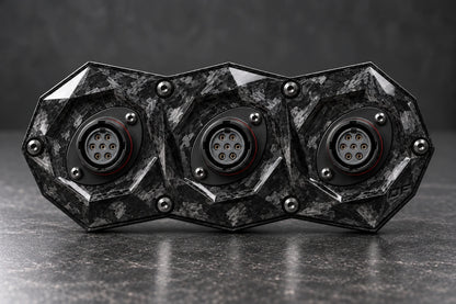 Dorifab compact triple forged carbon bulkhead connector plate, front view. Illustrative connector installation; connectors not included.