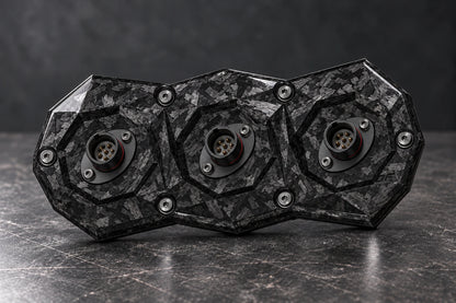 Dorifab compact triple forged carbon bulkhead connector plate, hero view. Illustrative connector installation; connectors not included.