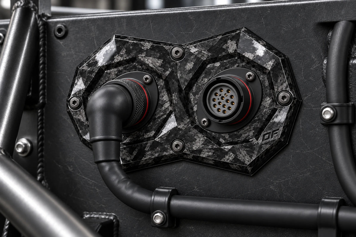 Dorifab medium dual forged carbon bulkhead connector plate, installed view. Illustrative connector installation; connectors not included.
