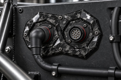 Dorifab medium dual forged carbon bulkhead connector plate, installed view. Illustrative connector installation; connectors not included.