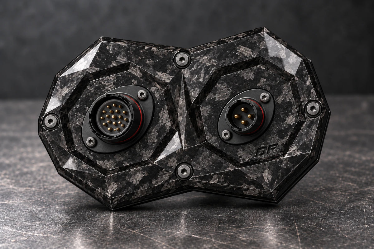 Dorifab medium dual forged carbon bulkhead connector plate, mixed shell sizes view. Illustrative connector installation; connectors not included.
