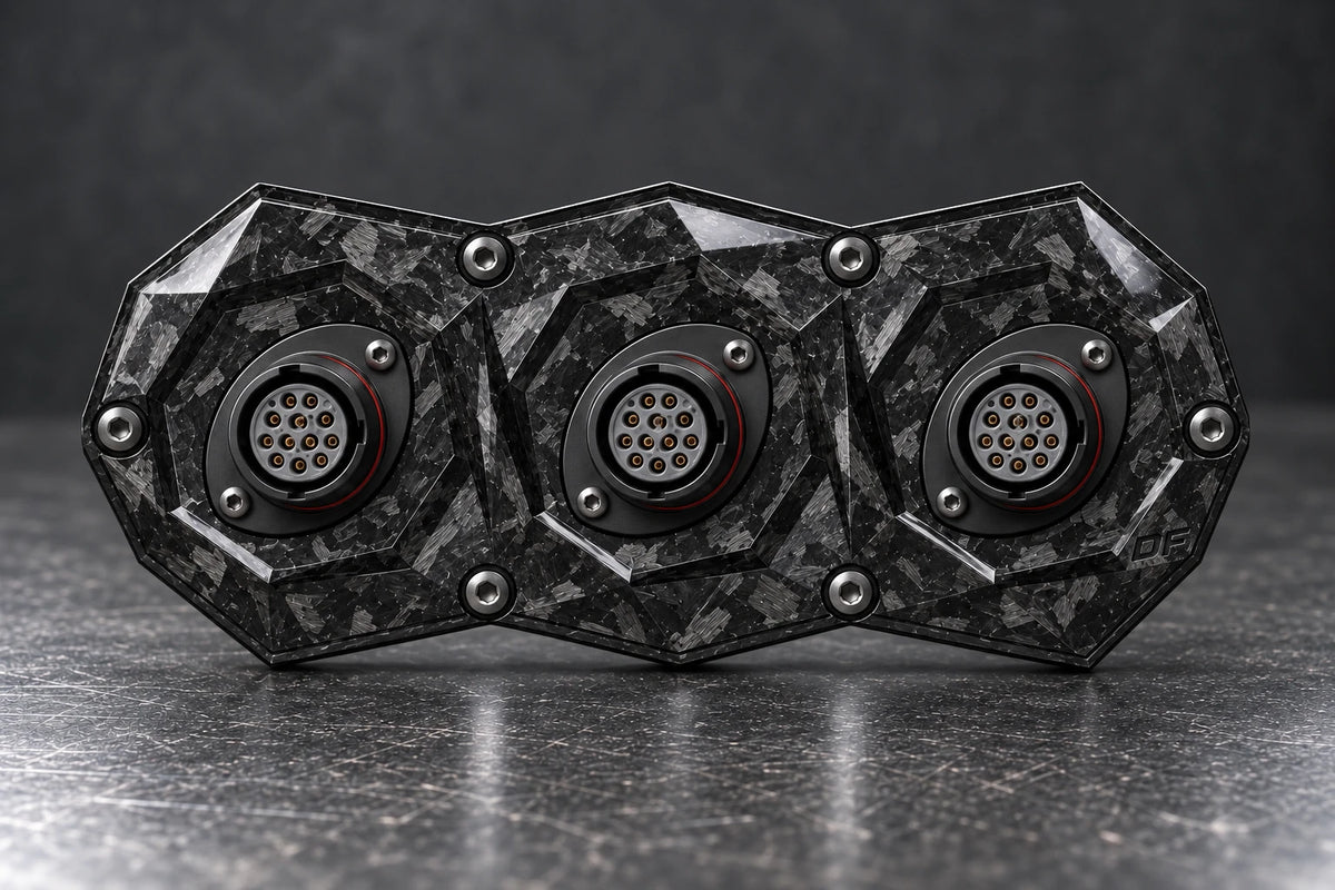 Dorifab medium triple forged carbon bulkhead connector plate, front view. Illustrative connector installation; connectors not included.