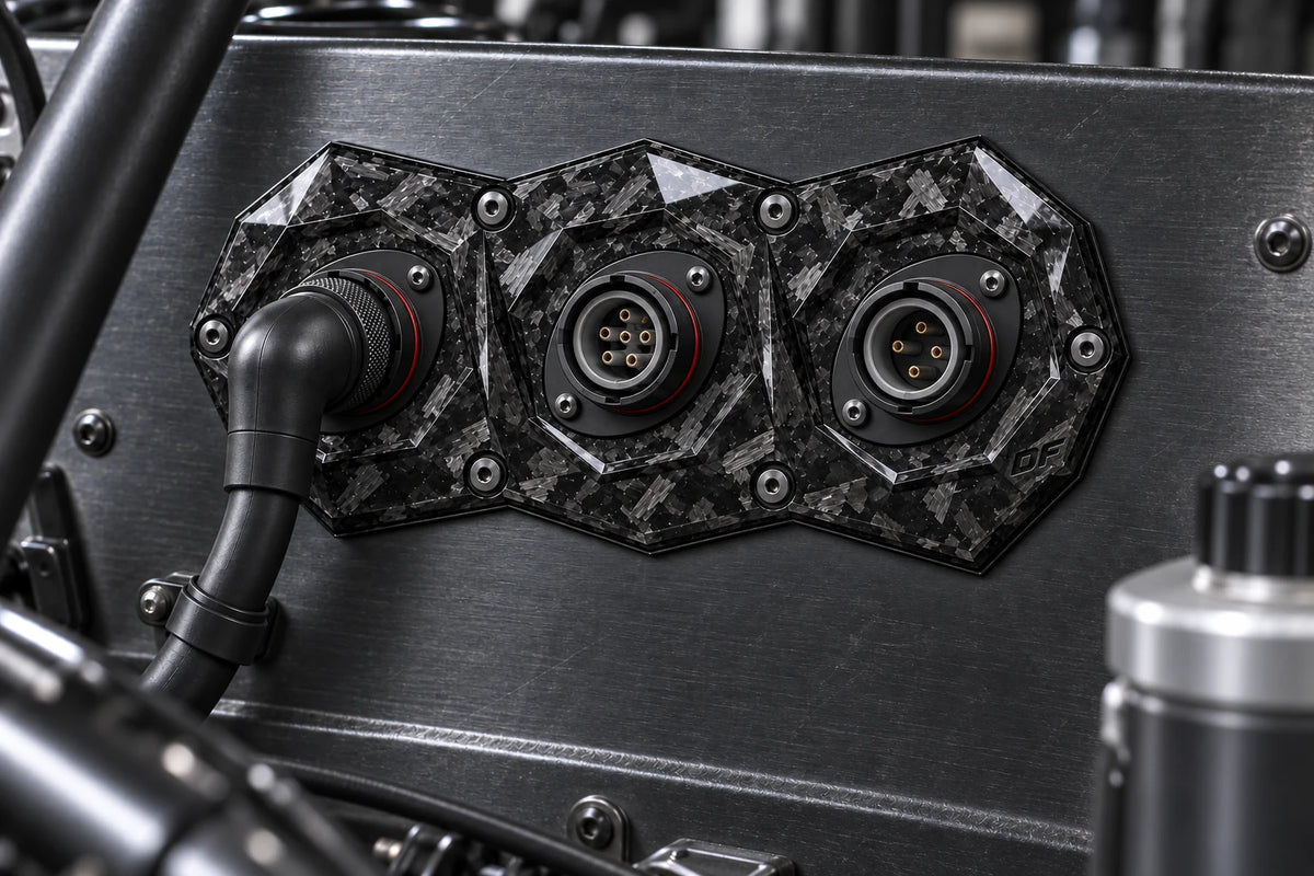Dorifab medium triple forged carbon bulkhead connector plate, installed view. Illustrative connector installation; connectors not included.