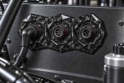 Dorifab medium triple forged carbon bulkhead connector plate, installed view. Illustrative connector installation; connectors not included.