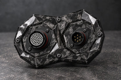 Large Dorifab dual forged carbon bulkhead plate with different connector shell sizes and illustrative contact layouts.