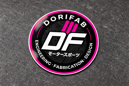 Dorifab Round DF Badge laminated die-cut sticker in magenta with a white border