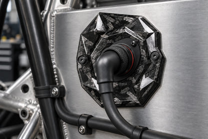 Large Dorifab single right forged carbon bulkhead plate installed on a motorsport firewall with a booted DR25 loom.