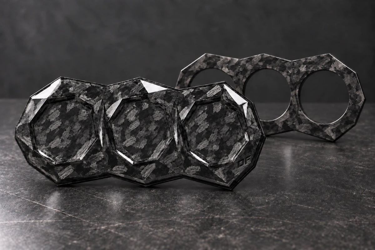 Large Dorifab triple forged carbon bulkhead plate blank with centre marks and a matching open backing frame.