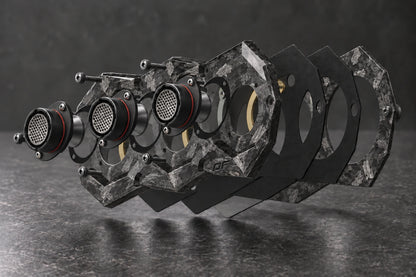 Large Exploded Dorifab triple forged carbon bulkhead plate showing connectors, gaskets and backing frame.