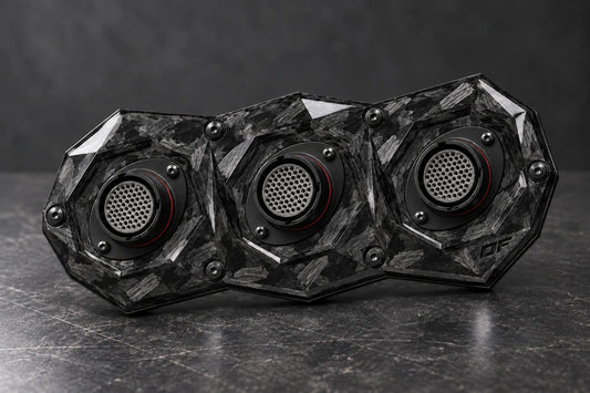 Large Dorifab triple forged carbon bulkhead plate with autosport connector fitment, three-quarter view.