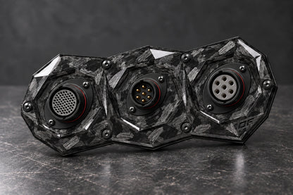 Large Dorifab triple forged carbon bulkhead plate with different connector shell sizes and illustrative contact layouts.